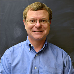 a profile photograph of Mark Swanson