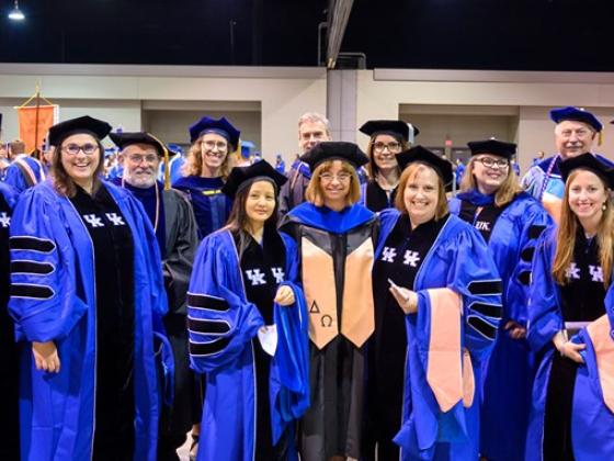a photograph of public health faculty at a graduation