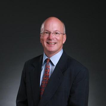 a profile photograph of Mark Bowman
