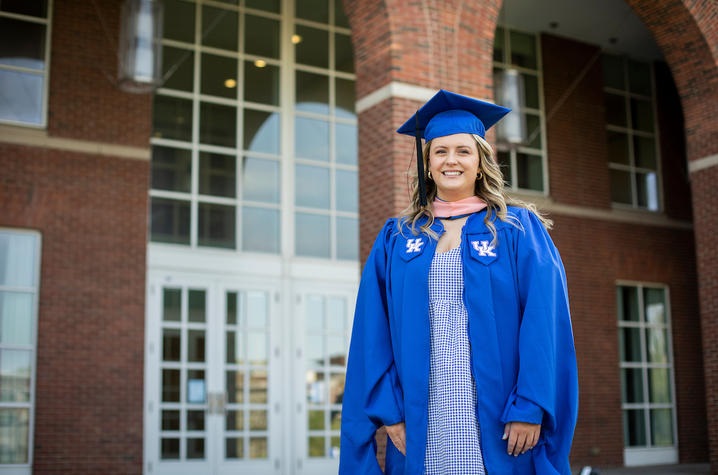 a photograph of Jacklyn Vollmer dressed in their graduation robes