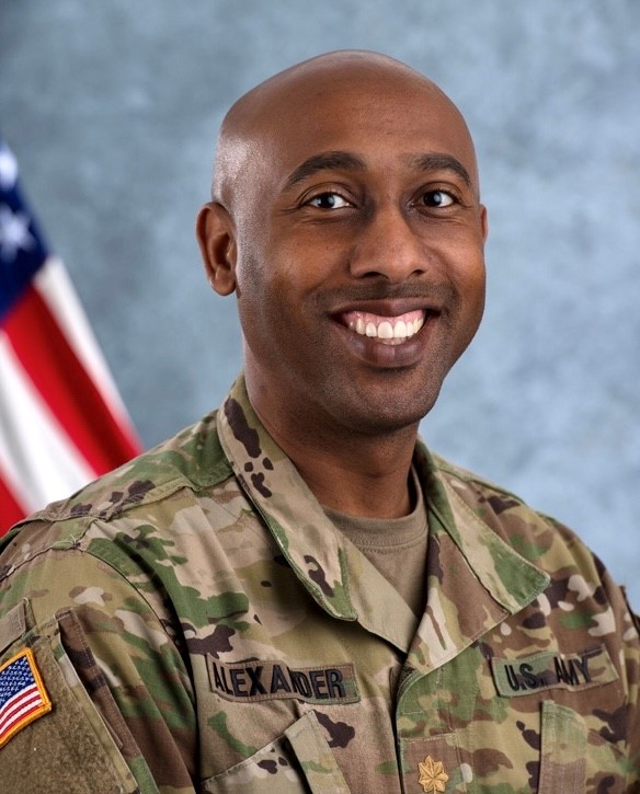 a photograph of Ahmad Alexander in their military fatigues
