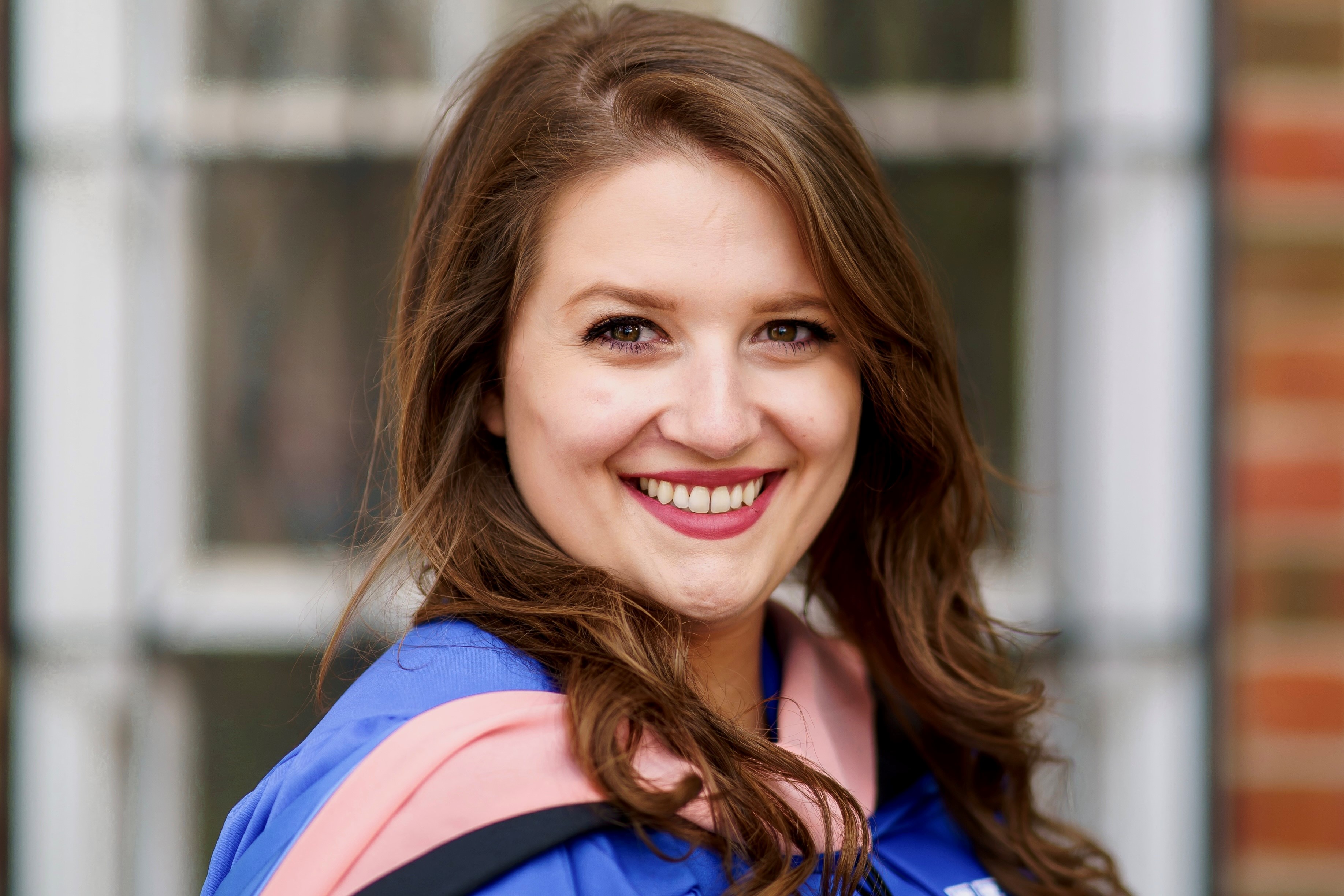 pictured is Sarah Jane Robbins in graduation regalia