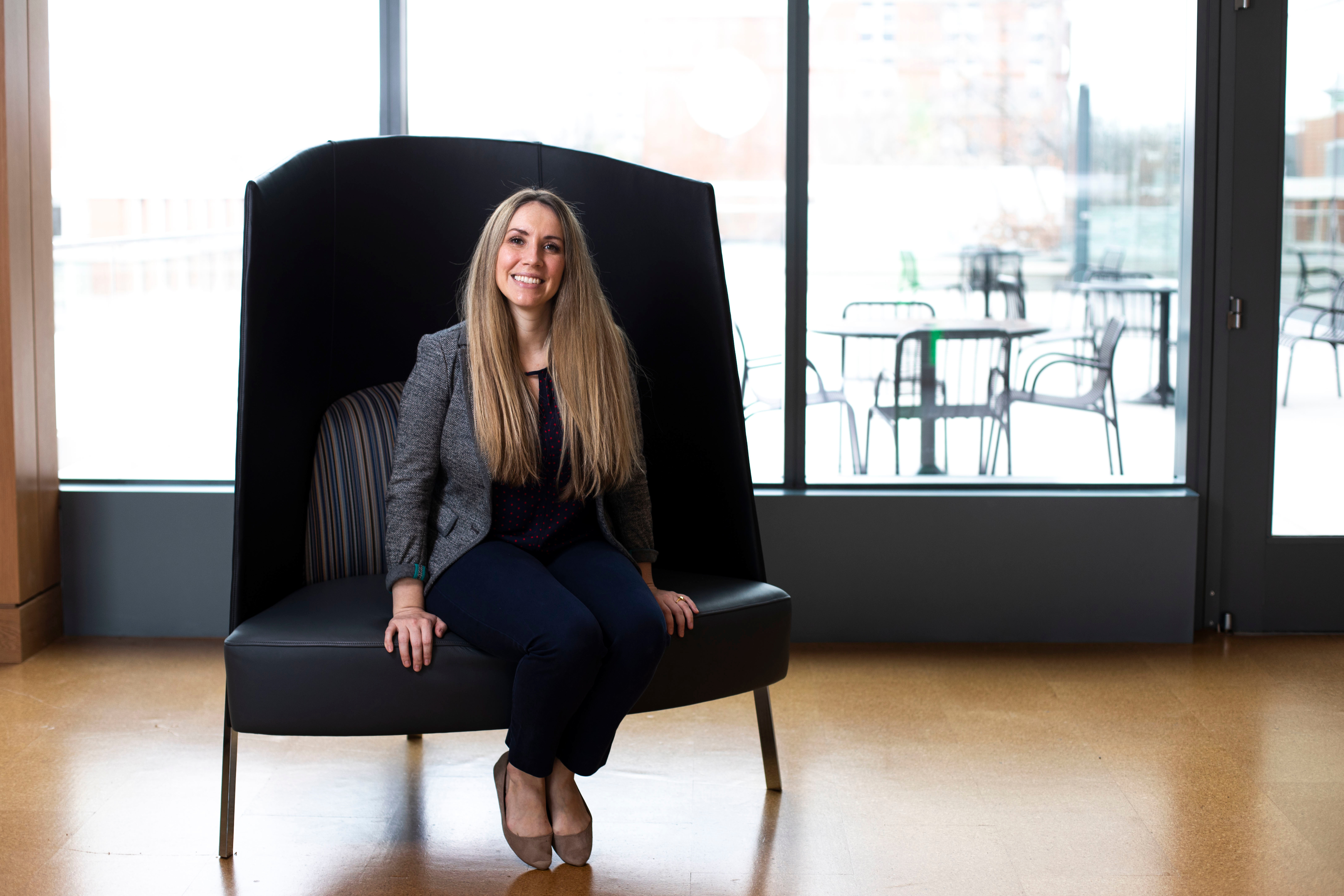 Rachel Vickers-Smith, an epidemiologist working with the HEAL initiative, sitting down.