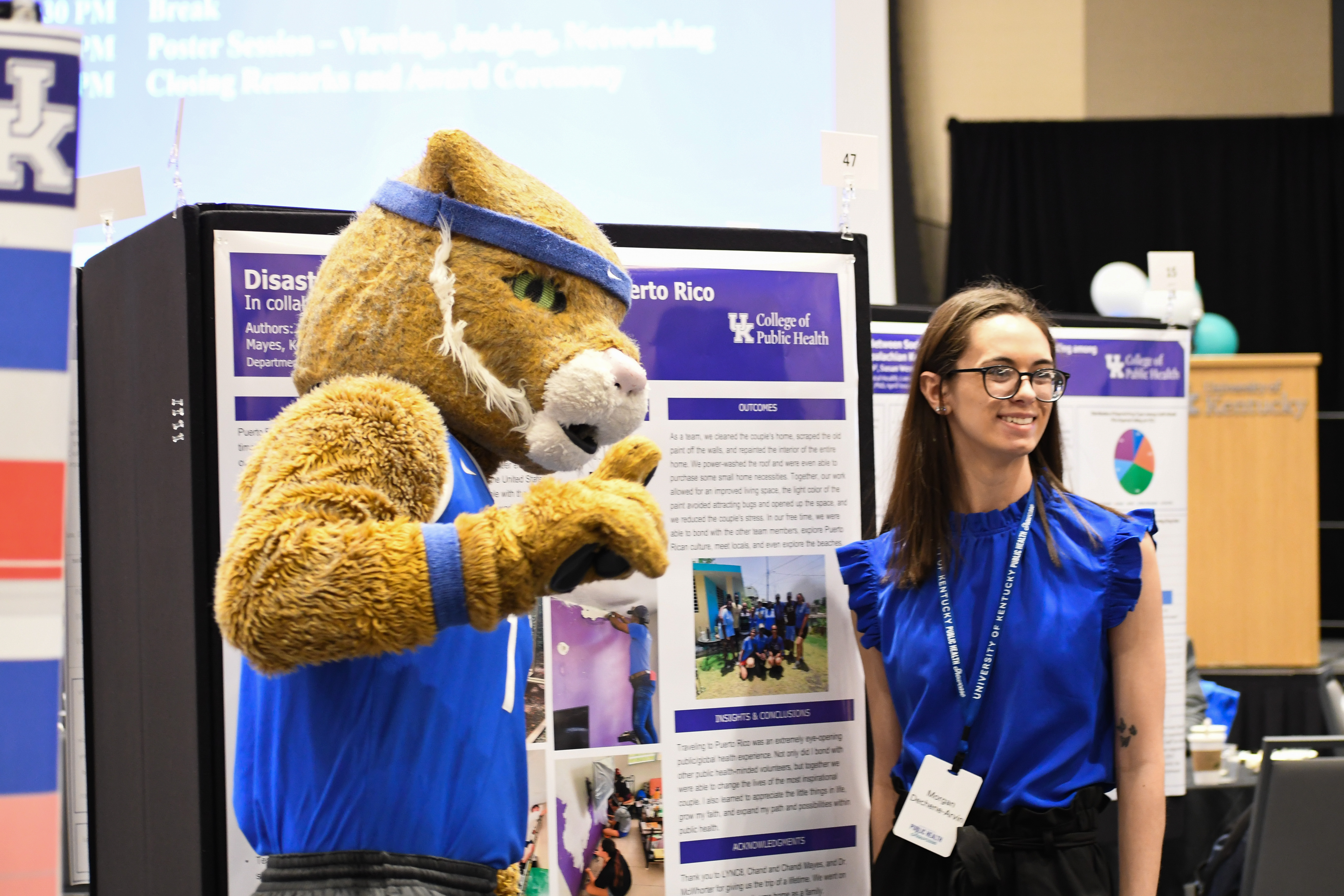 a photograph of the wildcat mascot at the public health showcase