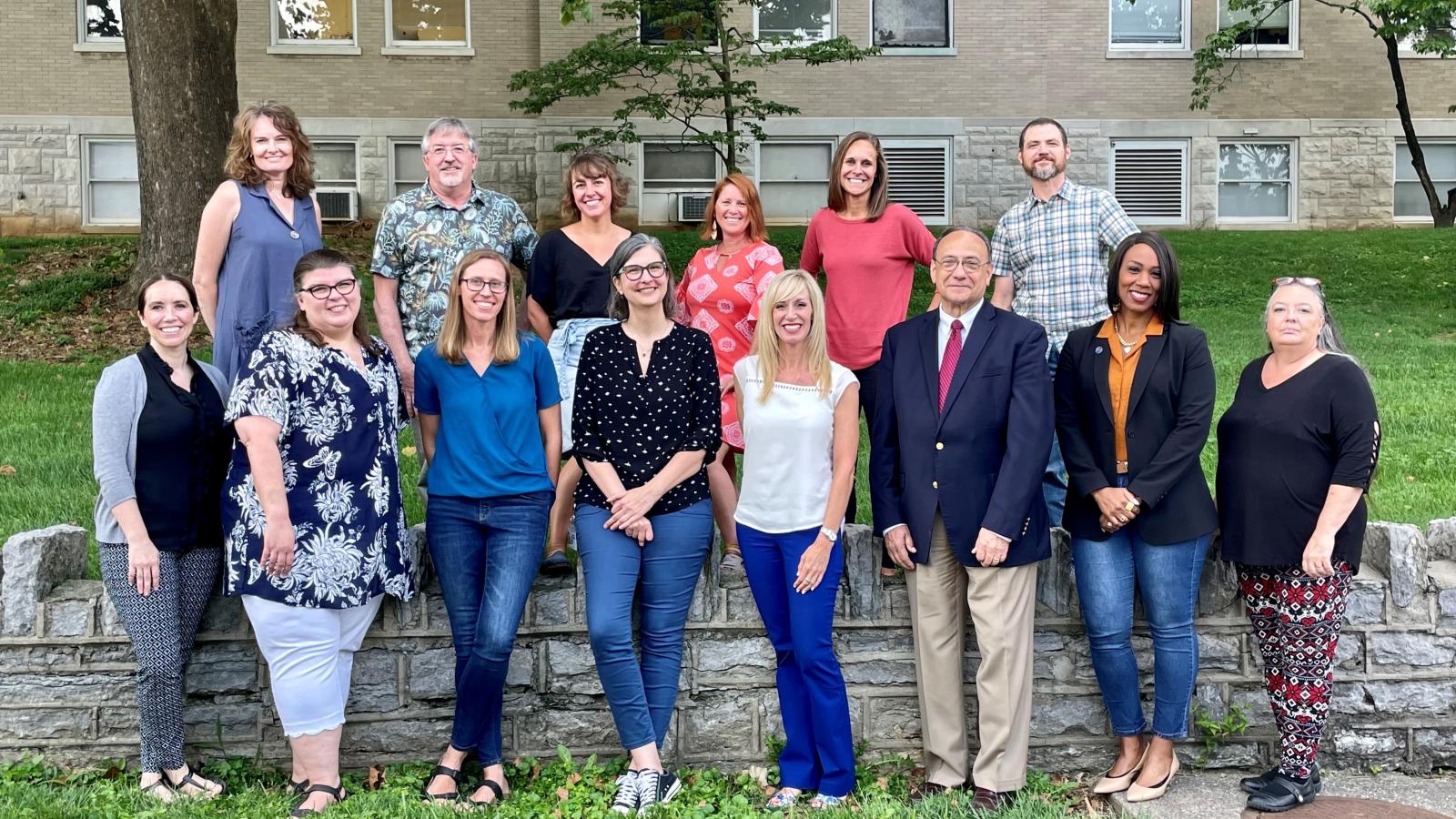 a group photograph of the College of Public Health's Epidemiology and Environmental Health department.
