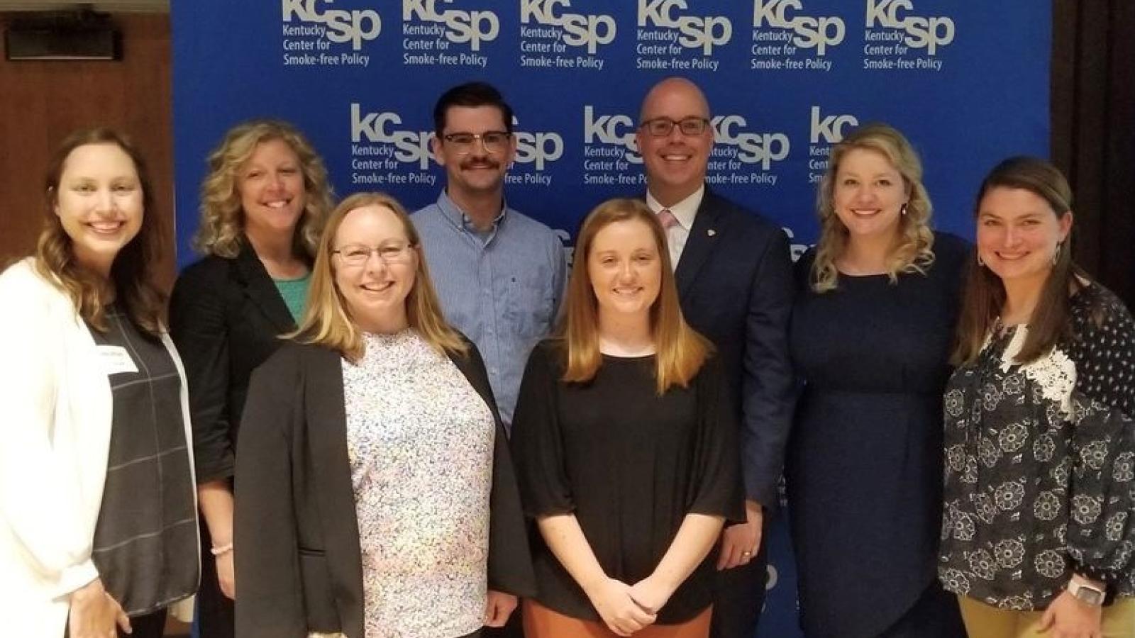 Ashley Duff pictured with group of Kentucky Department for Public Health leaders