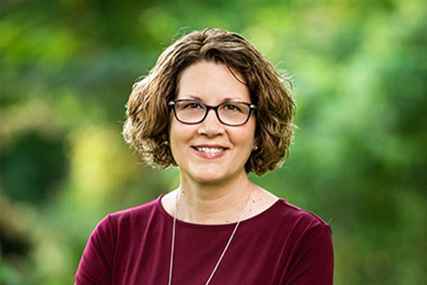 a profile photograph of Angela Carman