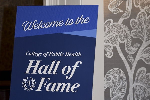 a photograph of a poster saying "welcome to the college of public health Hall of Fame 2025"