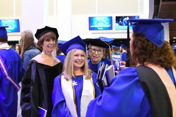 a photograph of College of Public Health students at graduation in their graduation robes