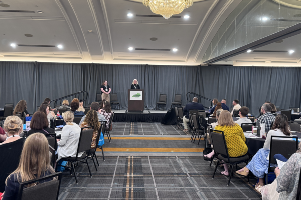 a photograph at the 2026 Kentucky Overdose Prevention Summit during a presentation