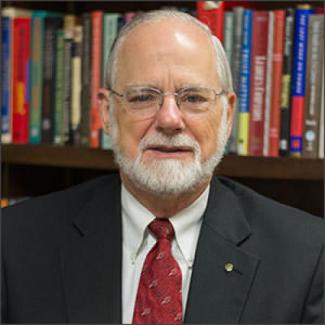 a profile photograph of James Holsinger