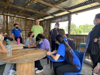 Ketrell McWhorter speaks to a group of students in Ecuador