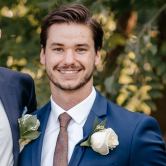 a profile photograph of Kory Heier