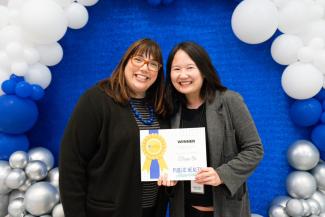 Student Gyeon Oh pictured with Dean Heather Bush