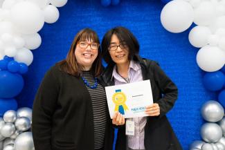 Student Gaixin Du pictured with Dean Heather Bush