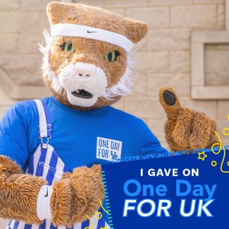 a photograph of the UK mascot with the text "I gave on one day for UK"