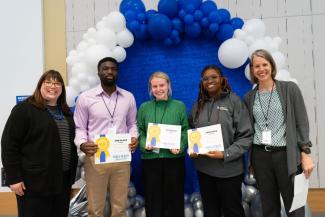 Students Christopher Otieno, Grace Mullikin, and Princess Magor Agbozo pictured with Dean Heather Bush and Dr. Sarah Vos