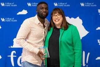 Pictured is Christopher Otieno with Dean Heather Bush