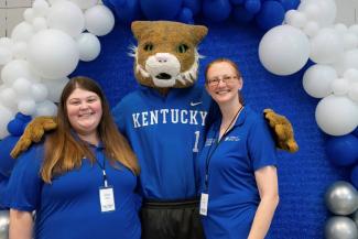 Elizabeth Crolley pictured with Wildcat and Erin Pyrek at 2023 Public Health Showcase event