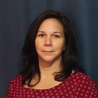a profile photograph of Marjorie Stanek