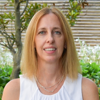 a profile photograph of Christin Kane