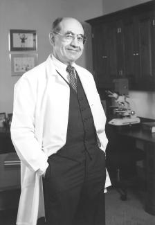 a profile photograph of Gilbert Friedell