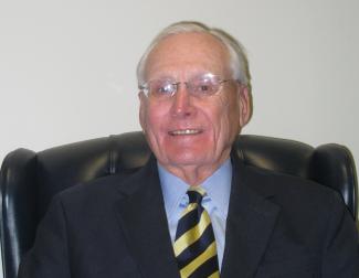 a profile photograph of James Cecil, III