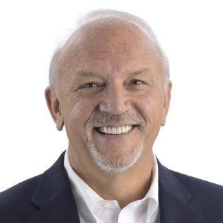 a profile photograph of Russell Cox