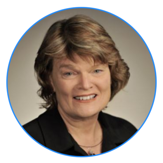 a profile photograph of Ann Coker