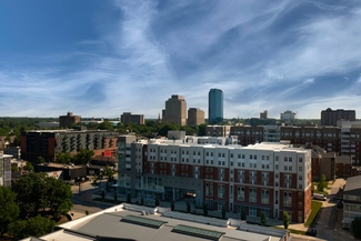 a stock photograph of the University of Kentucky's campus with the Lexington Skyline in the background