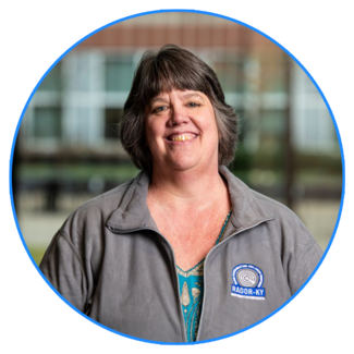 a profile photograph of Trish Freeman