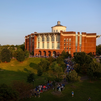 a photograph of the University of Kentucky's W. T. Young library at sunset