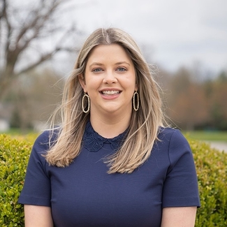 a profile photograph of Kelsey Carter