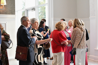 a candid photograph of atendees at the event