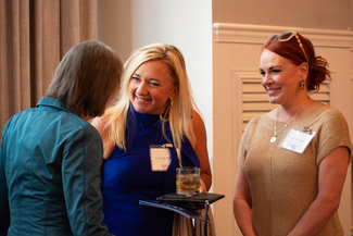 a photograph of attendees socializing