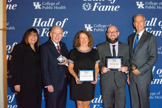 a photograph of the award winners and Heather Bush