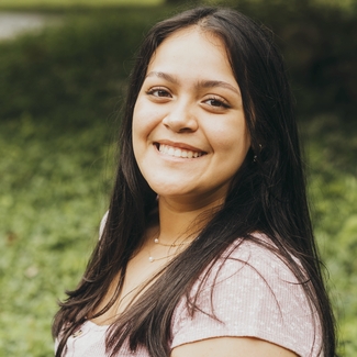 a profile photograph of Daphne Ramon