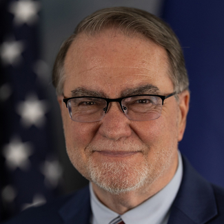 a profile photograph of John Langefeld