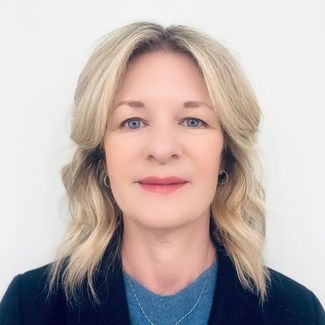 a profile photograph of Debbie Miller