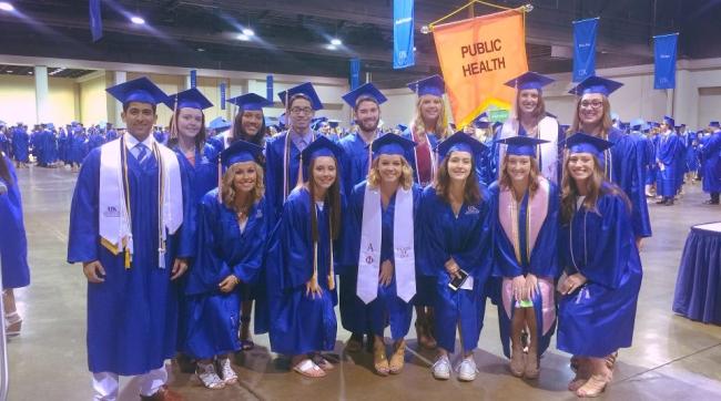 picture of a group of public health students in graduation regalia