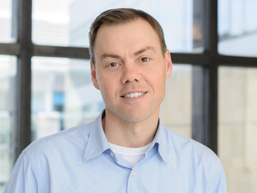 a profile photograph of Dr. Brent Coull