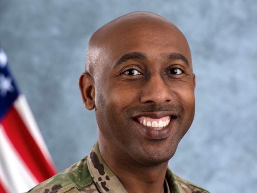 a photograph of Ahmad Alexander in their military fatigues