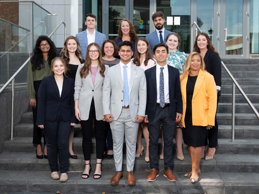 the MHA Fall 2021 Cohort of students posing on steps. Back Row: Jason Moore, Jessica Ahlgrim, Ali Ahmad Middle Row: Tharunika Venkatesan, Hannah Wethington, Holly Powers, Kate Cox, Shelby Watkins, Megan Gilmore Front Row: Becca Rawlings, Kaitlyn Shell, Shivang Patel, Corbin Kirksey, Tisha Clayborn