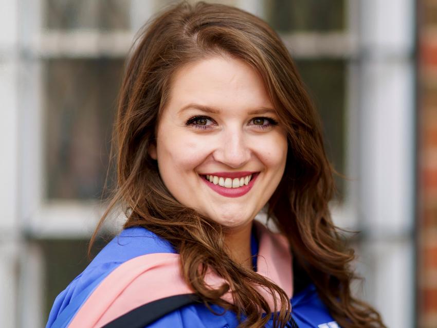 pictured is Sarah Jane Robbins in graduation regalia