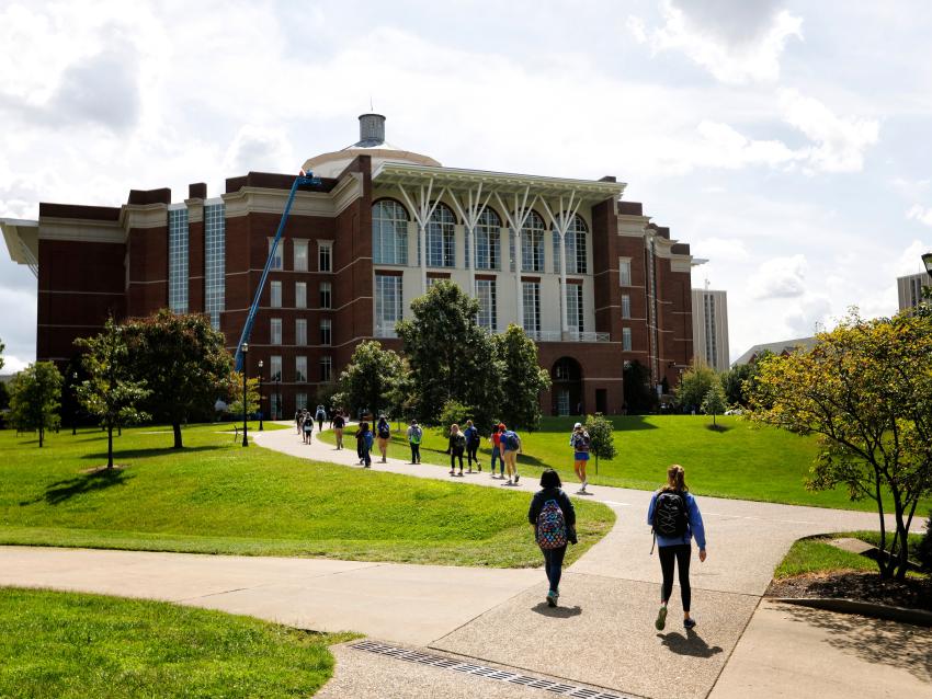 a photograph of students walking to the William T. Young Library on the University of Kentucky's campus