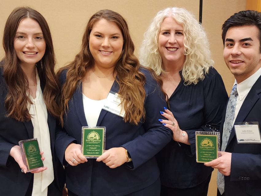 Dr. Maureen Jones pictured with MHA student competition team at UAB