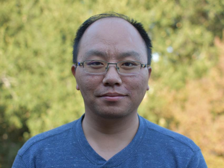 a photograph of Tianjun Lu