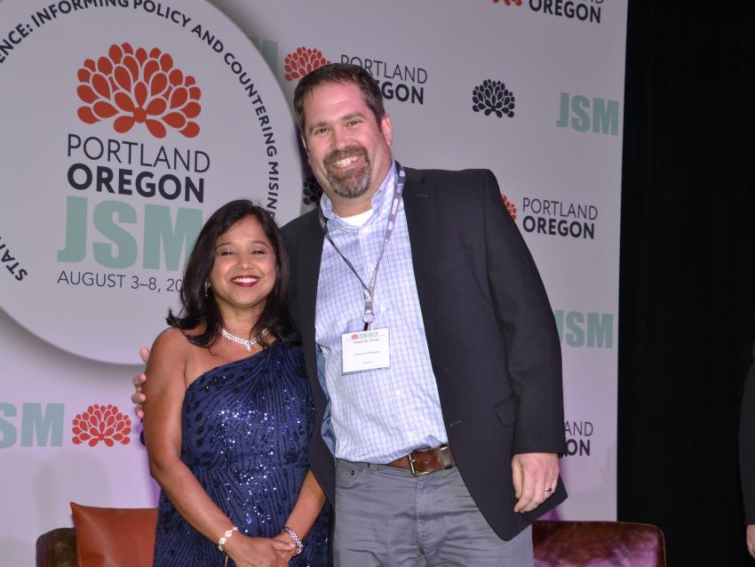 a photograph of David Fardo posing for photos at the Portland Oregon JSM