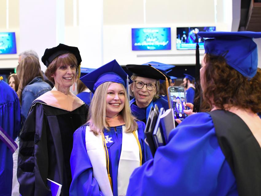 a photograph of College of Public Health students at graduation in their graduation robes