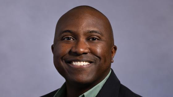 a profile photograph of Alex Howard